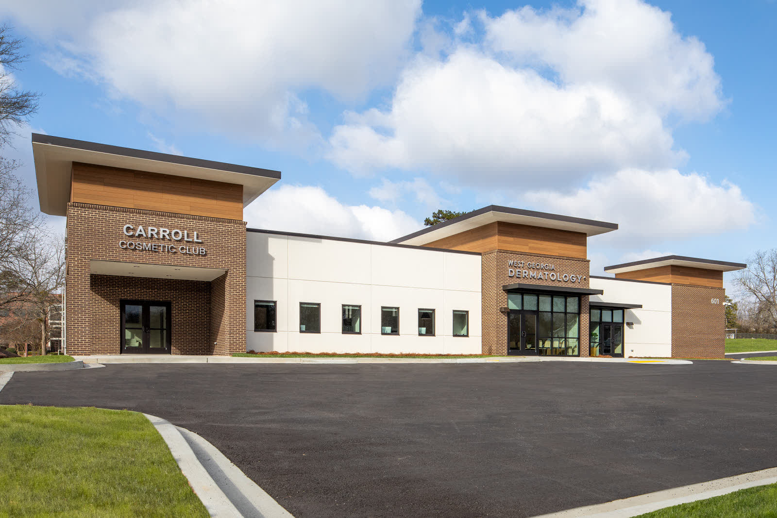 The front of the West Georgia Dermatology office on Dixie Street in Carrollton, with the Carroll Cosmetic Club entrance beside it