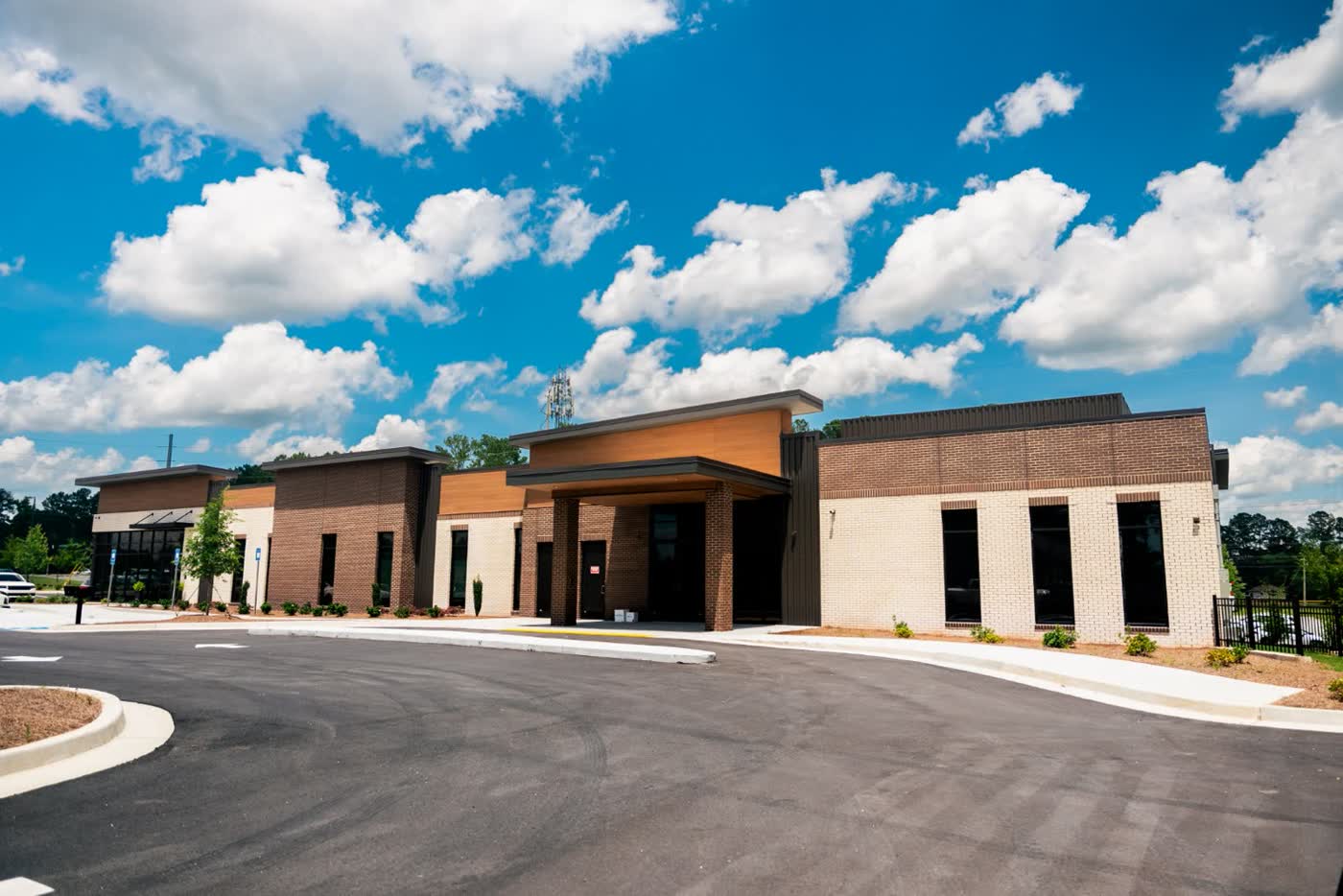 The entrance to Peachtree City Dermatology and Carroll Cosmetic Club Peachtree City, with free parking and cart parking out front