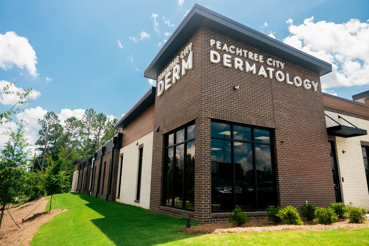 The Peachtree City Dermatology building at 112 Wilshire Village Drive, where the Carroll Cosmetic Club Peachtree City studio is located