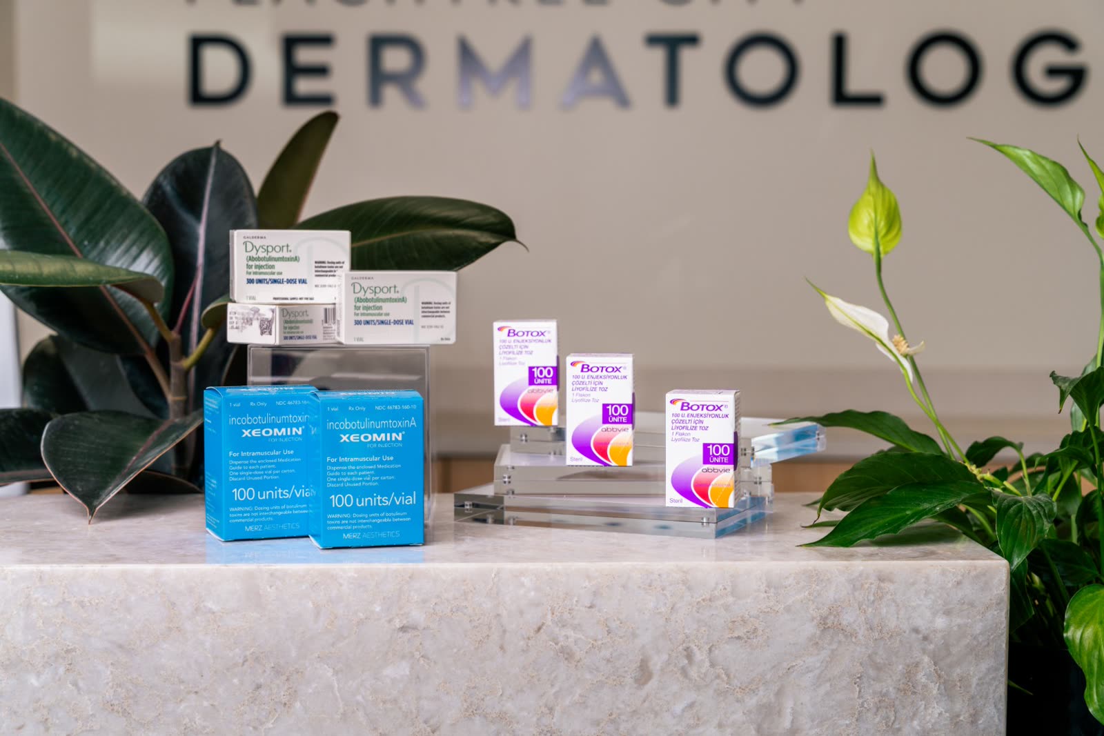 Xeomin, Botox and Dysport packaging on the studio counter