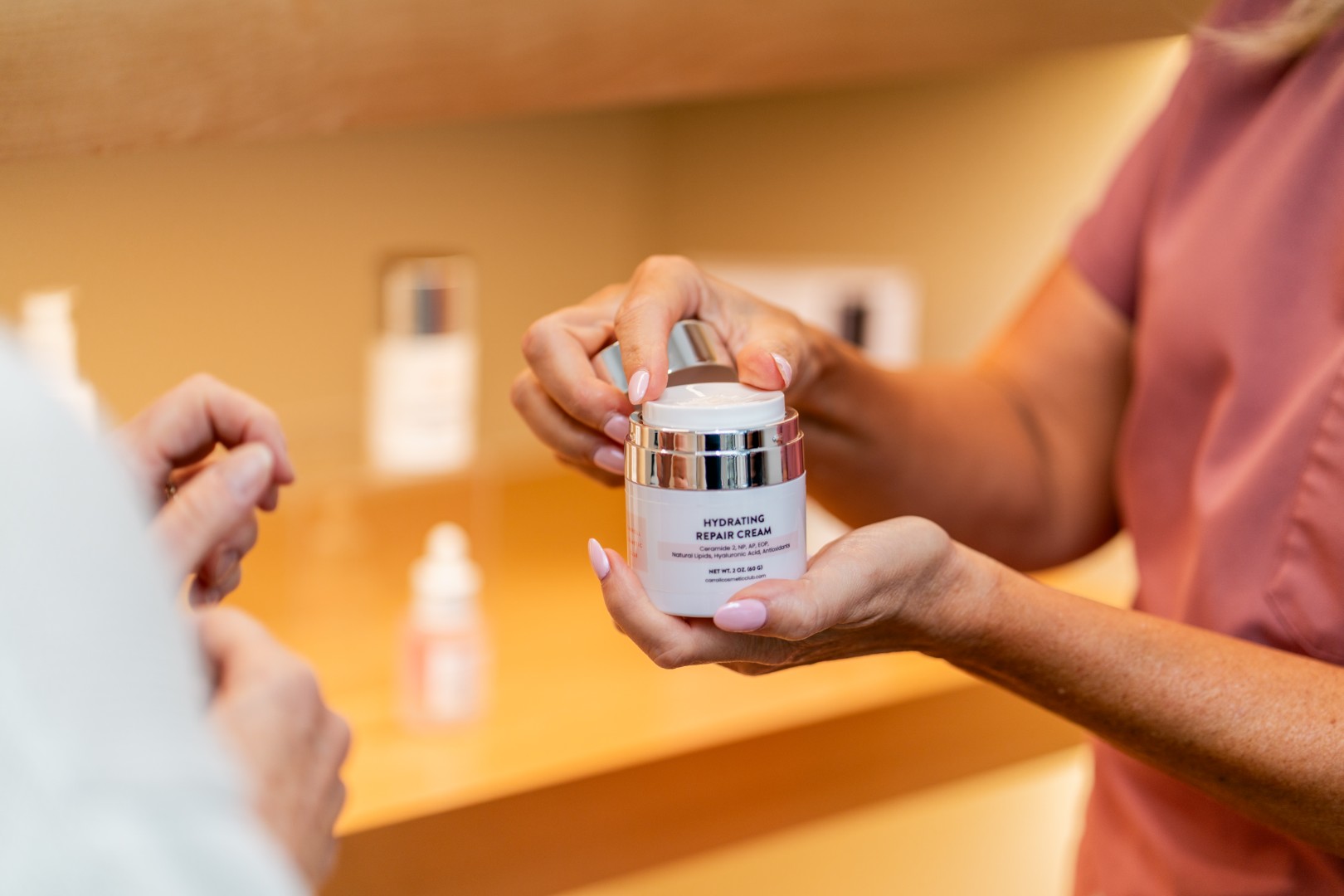 Provider demonstrating a medical-grade serum